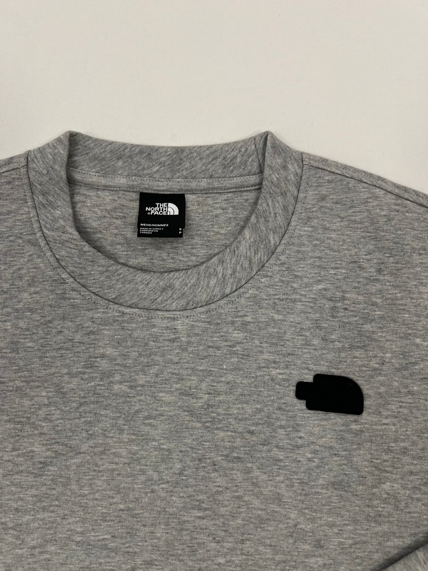 The North Face Sivi Duks sa Crnim Gumenim Logom