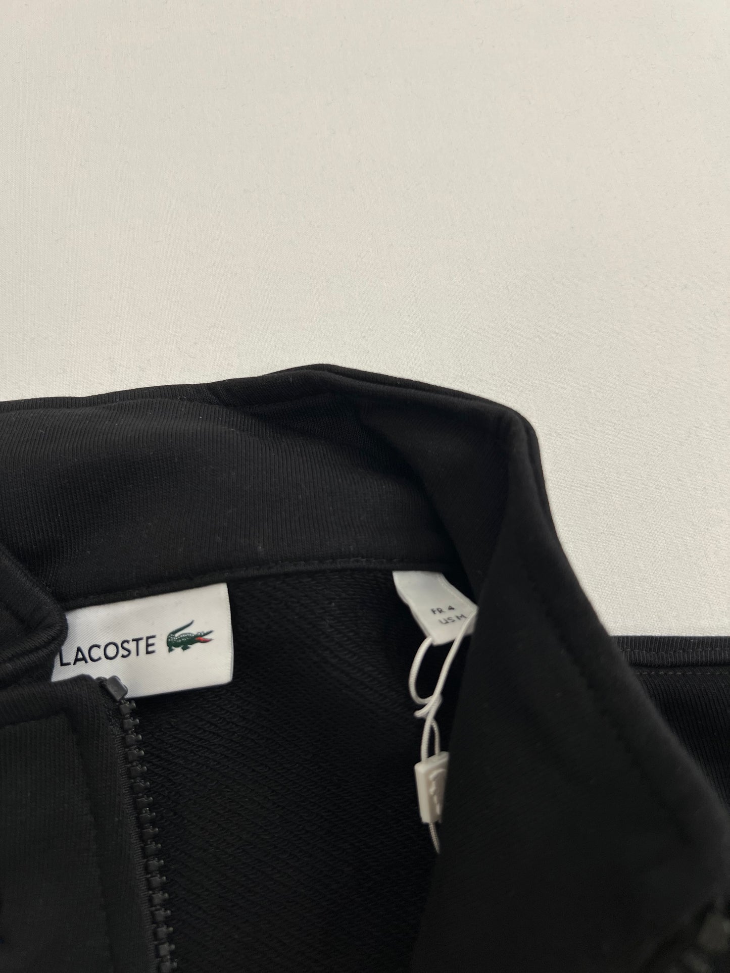 Lacoste Crni Half-Zip Duks sa Le Club Lacoste Logom