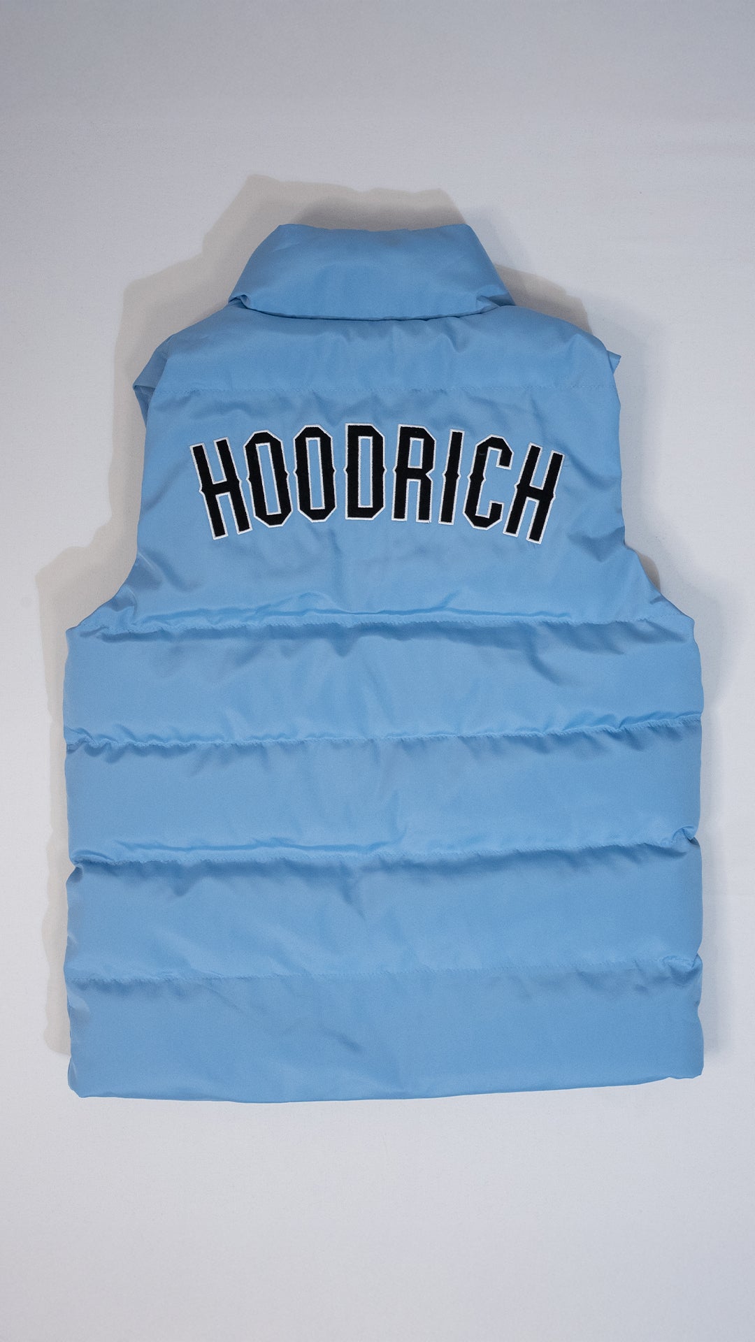 HOODRICH Baby Blue Prsluk sa Back Printom