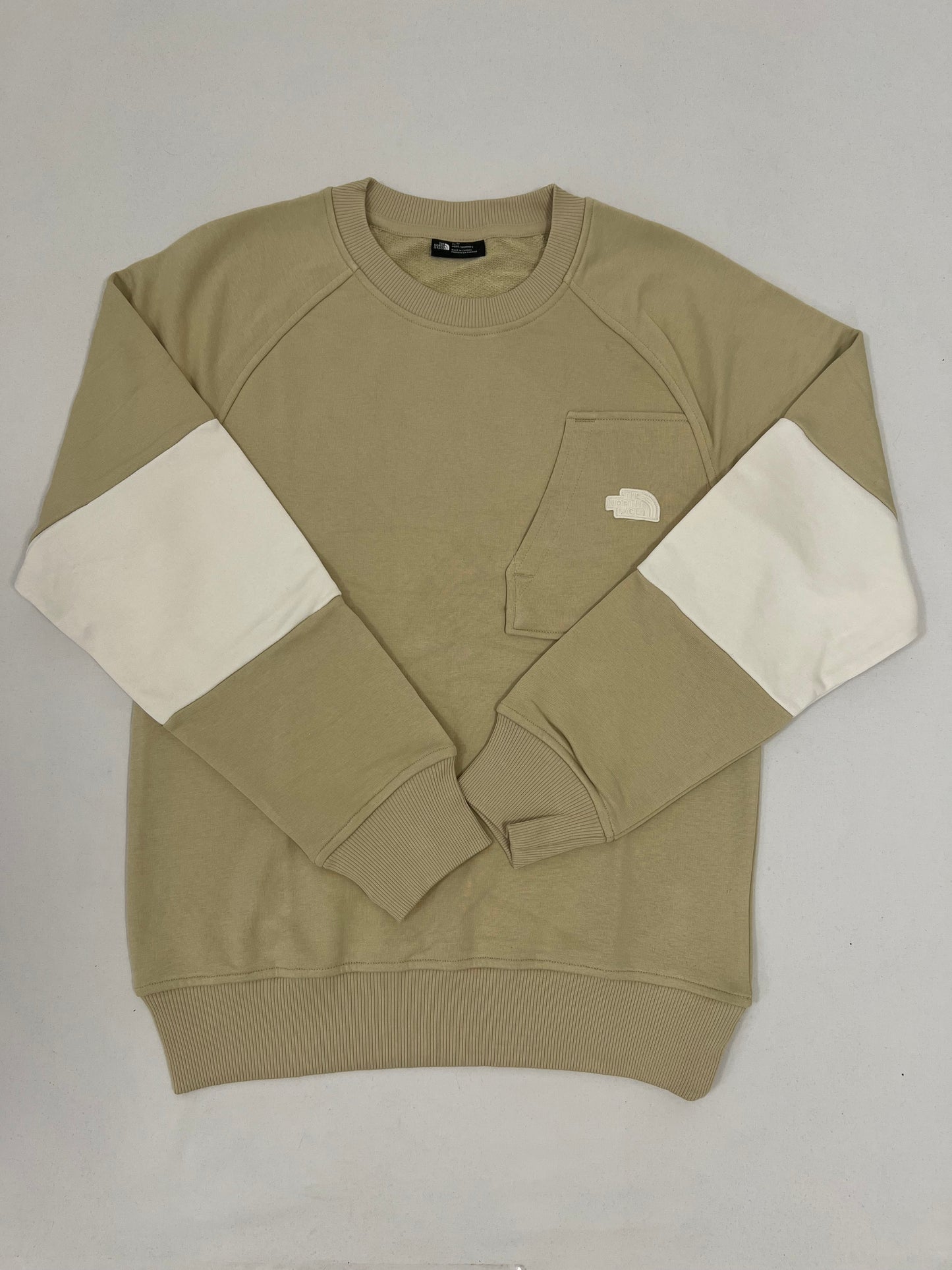 The North Face Bež Duks sa Džepićem i Belim Detaljom na Rukavu