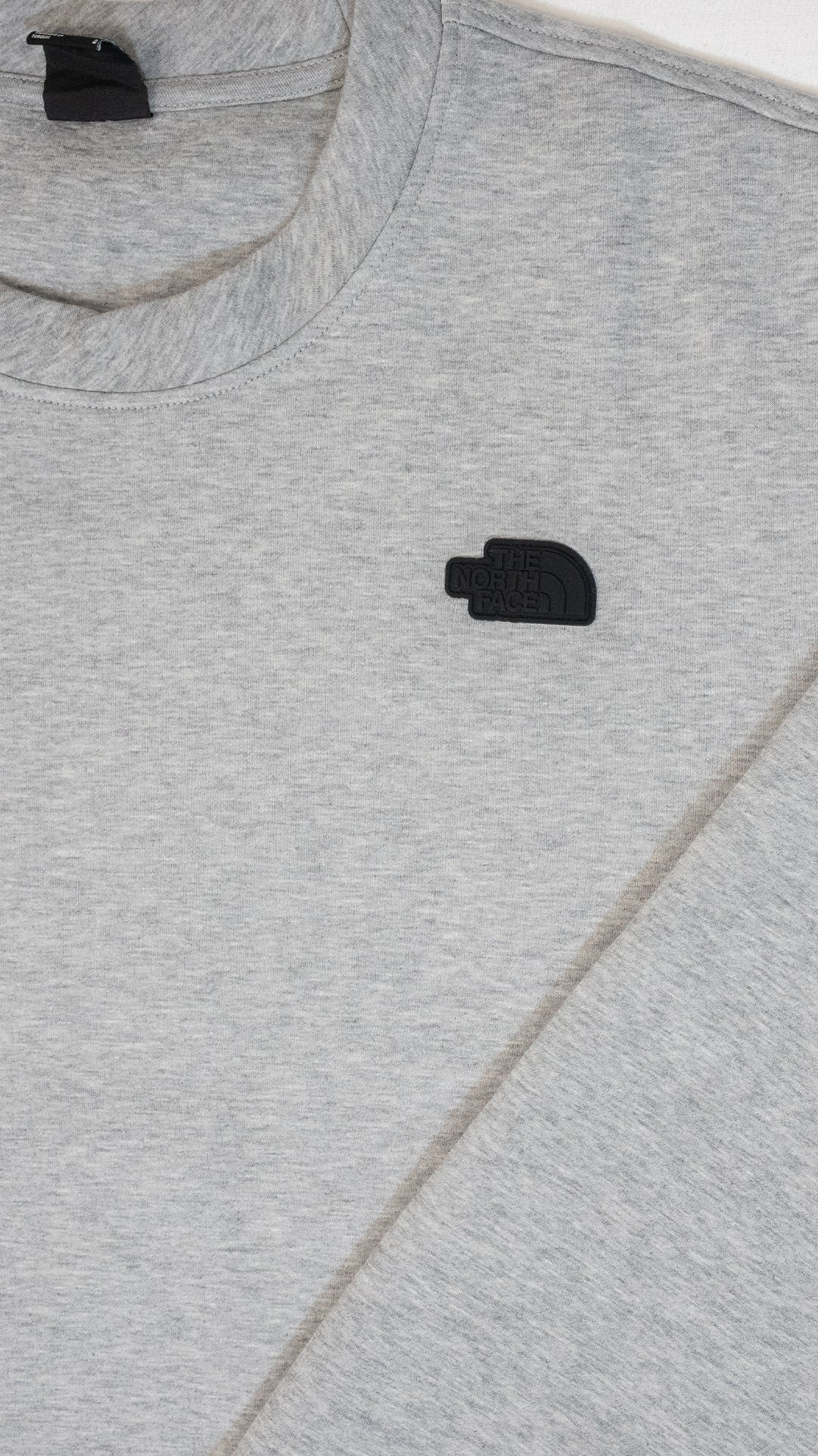 The North Face Sivi Duks sa Crnim Gumenim Logom