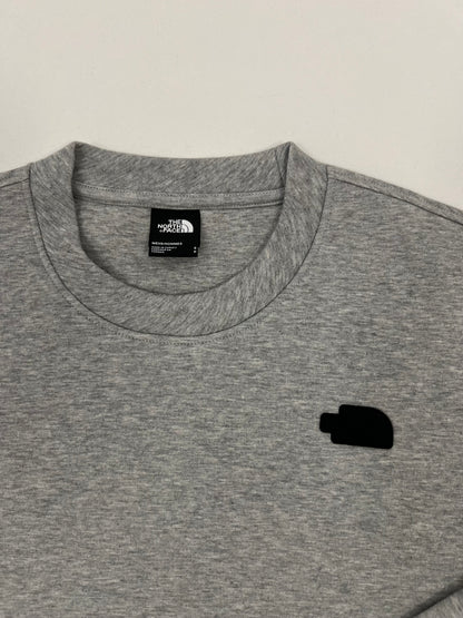 The North Face Sivi Duks sa Crnim Gumenim Logom