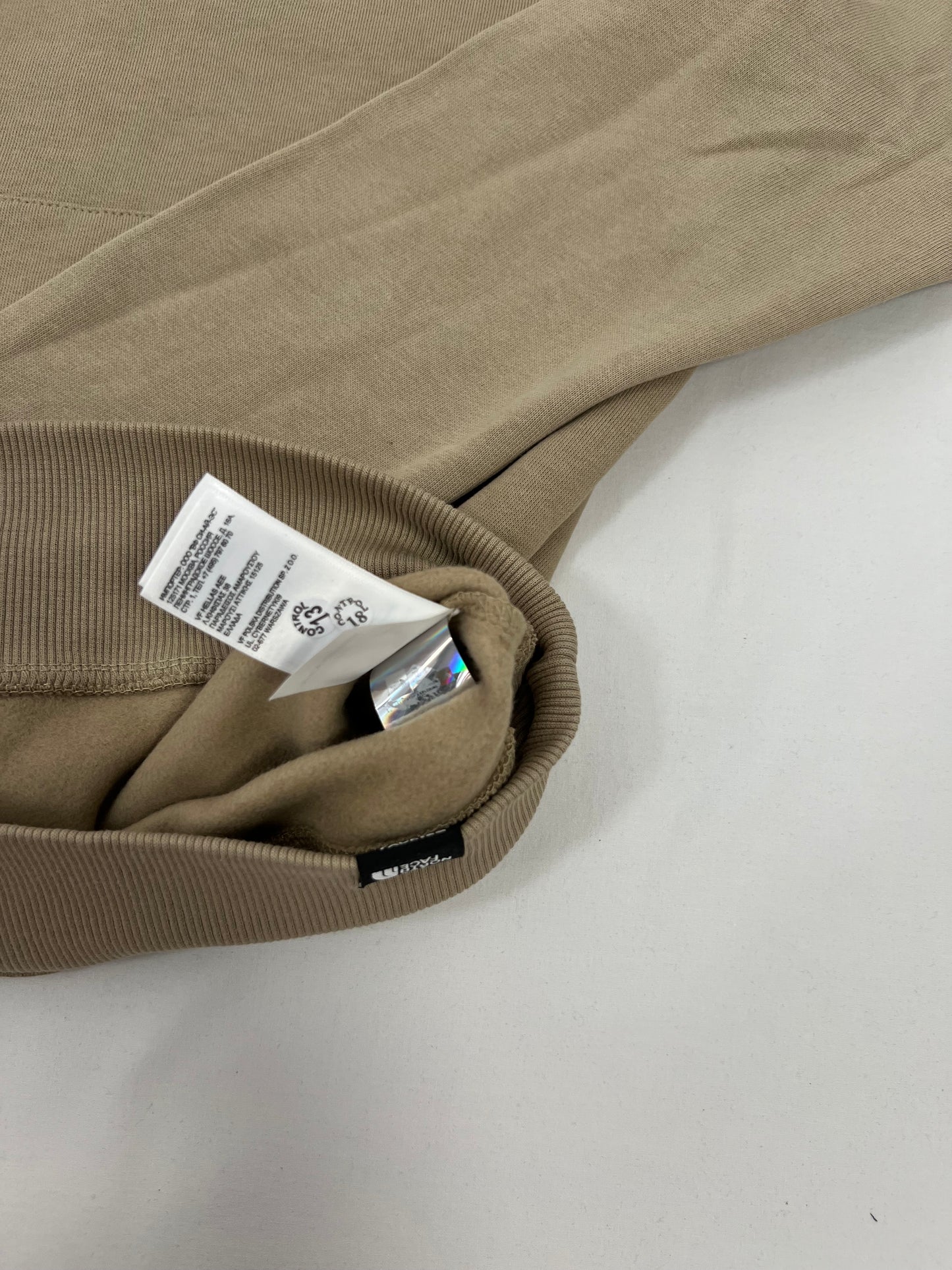 The North Face Krem Duks sa Vertical Printom na Leðima